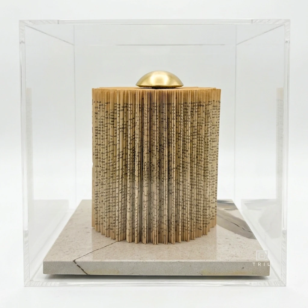 Escultura livro com pedra